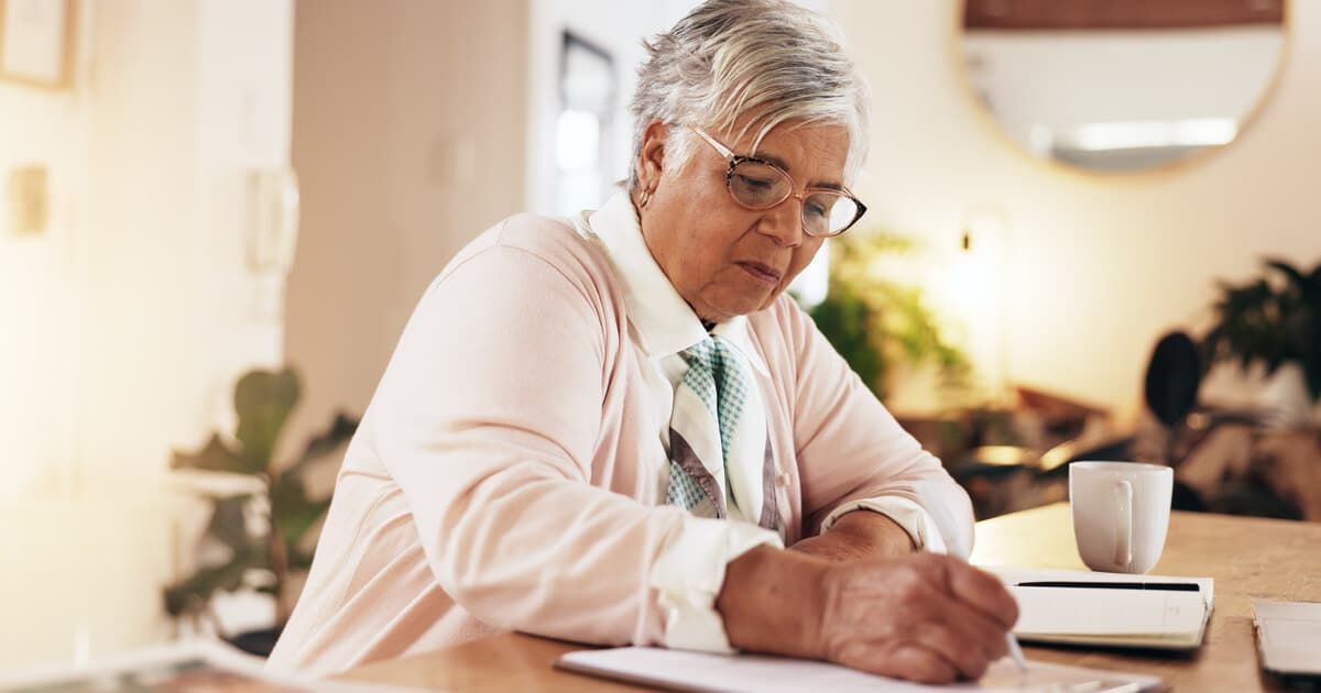 Woman is making a list of her assets according to her estate planning checklist California.