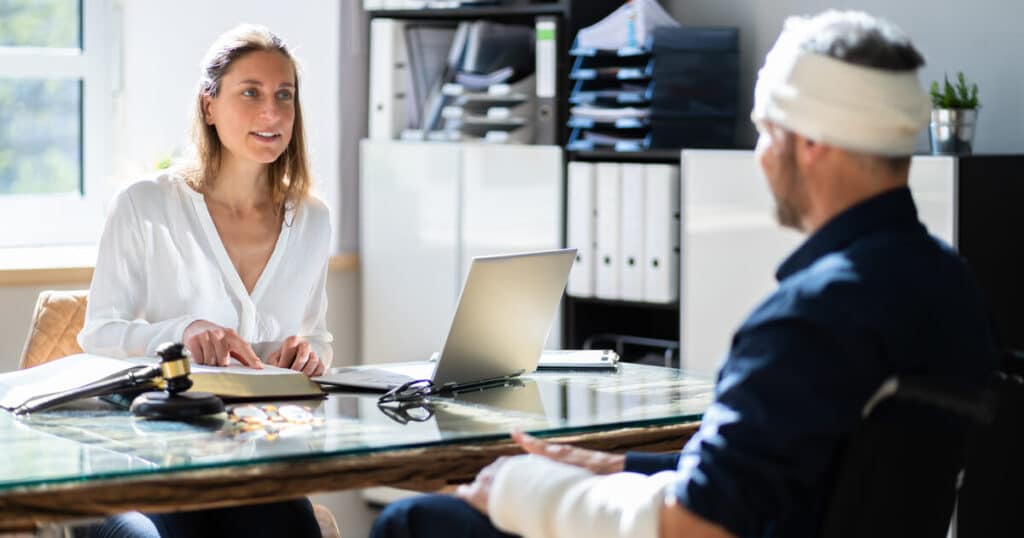 A man injured in a car accident decides to consult an auto accident lawyer instead of an auto accident settlement calculator.