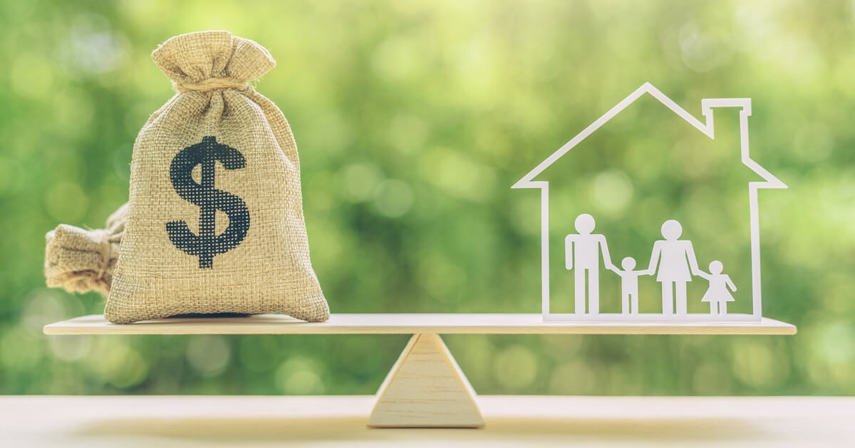 A scale shows money on one side and an estate on the other. California estate planning cost must be weighed against the benefit of protecting family and estate for future generations.