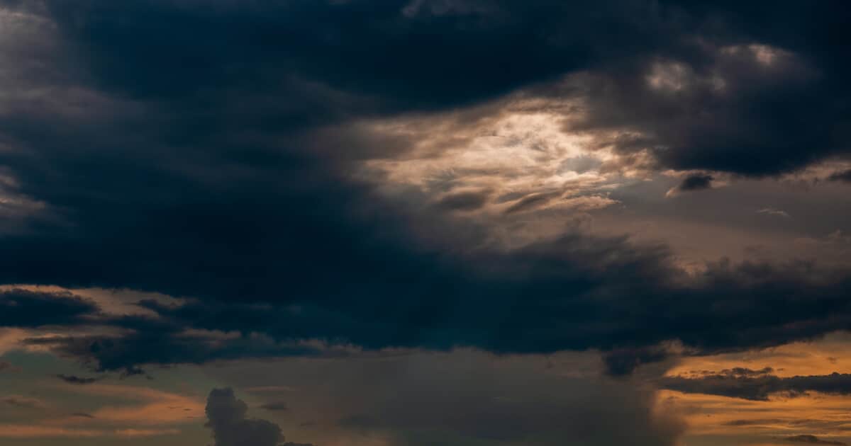 A photograph of a dark sky with a ray of light breaking through is a reminder that innocent spouse relief can provide hope in a very difficult scenario.
