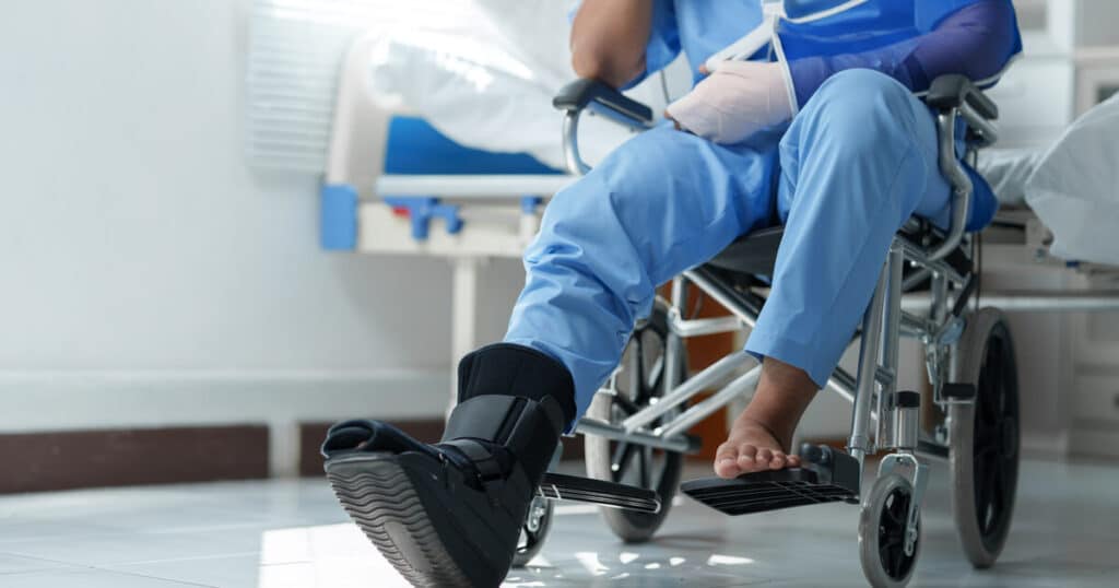 An injured worker with a broken arm and foot may pursue workers comp and third party claims.