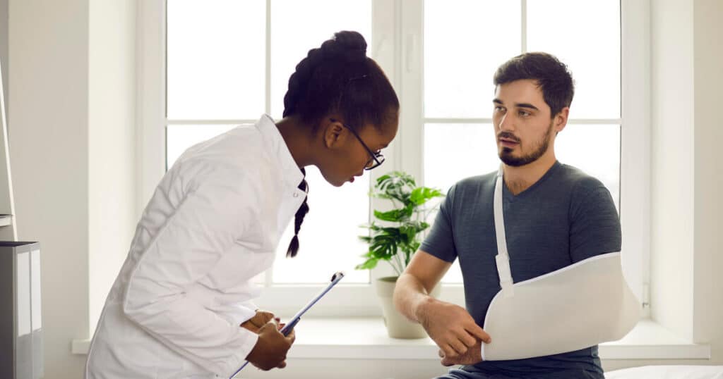 A man who broke his arm on the job is visiting a doctor because of workers comp for part time employees.