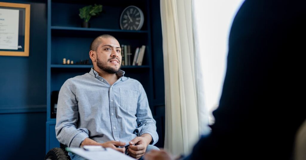 After talking to a workers' comp injury lawyer, an injured man realizes how complicated workers' compensation settlements can be.